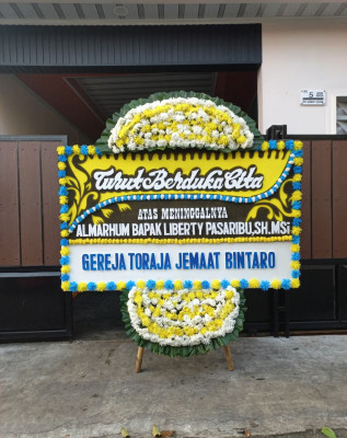 Papan Bunga Duka di Pilolodaa